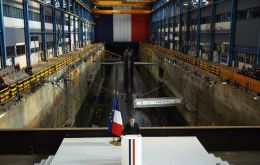 Macron spoke at the &Icirc;le Longue naval base near Brest, addressing naval officers with a nuclear submarine in the background