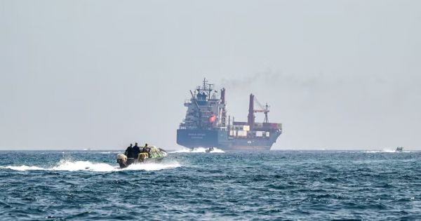 Iran says it hit a US oil tanker in the Gulf and warns on transit through Hormuz
