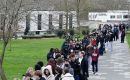 Queues of young people waiting to be vaccinated in the UK 
