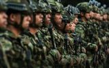 Soldiers of the Colombian National Army at attention. Photo: AFP