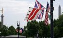 Fifteen Australian flags were briefly included among more than 230 flags put on display ⁠to welcome the ⁠British king when he arrives in the U.S. capital on Monday