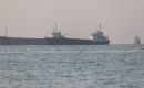 Iran's General Staff declared Hormuz closed to all traffic and warned it would fire on any vessel, while the United States maintained that transit continues