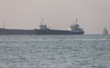 Iran's General Staff declared Hormuz closed to all traffic and warned it would fire on any vessel, while the United States maintained that transit continues