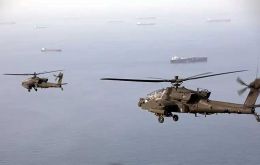 US Apaches fly over the Strait of Hormuz (Picture: Centcom)