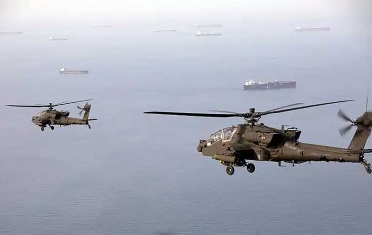 US Apaches fly over the Strait of Hormuz (Picture: Centcom)