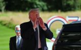 Trump arrived in Évian from Geneva airport, where he landed in the early afternoon. At the Hôtel Royal in the spa town, the French leader was not waiting for him on the red carpet