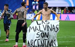 The banner was reportedly thrown from the stands. FIFA's code of conduct prohibits political flags and items inside stadiums. Photo: SHAUN BOTTERILL / GETTY IMAGES