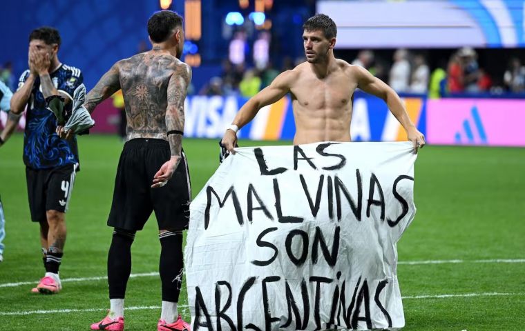 The banner was reportedly thrown from the stands. FIFA's code of conduct prohibits political flags and items inside stadiums. Photo: SHAUN BOTTERILL / GETTY IMAGES