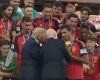Trump takes center stage at the World Cup final, presenting Spain's trophy and holding it beforehand