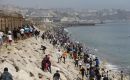 Spain's Interior Ministry put at around 50,000 the number who entered since Thursday and at 48,300 those who had already returned voluntarily to Morocco, according to its latest Friday update
