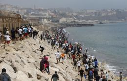 Spain's Interior Ministry put at around 50,000 the number who entered since Thursday and at 48,300 those who had already returned voluntarily to Morocco, according to its latest Friday update