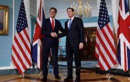 The two leaders smile and shake hands following the 90 minutes meeting at the US State Department 