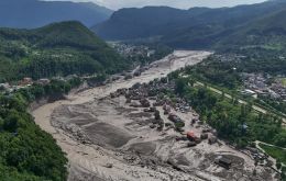 The flash flood tore through the north of the country on August 26, destroying homes, roads and bridges and cutting off entire communities