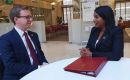 Minister Uma Kumaran and  MLA Jack Ford in discussion following her statement to Parliament