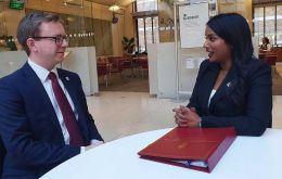 Minister Uma Kumaran and  MLA Jack Ford in discussion following her statement to Parliament