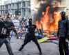 Rioting kehrt nach einem Tag der Proteste nach Paris zurück, an dem 1.800 Verhaftungen in ganz Frankreich stattfanden