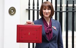 The previous Labour Chancellor, Rachel Reeves holding the famous red Budget box