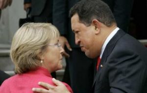 Pte. Michelle Bachelet and her counterpart Hugo Chavez