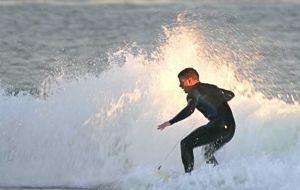 Surf up! THIS action shot was captured by Chris Harris, not at a beach in Hawaii but in Stanley - turn to page 2 for the story.