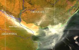 Satellite images showed wind carrying a swath of white smoke over the capital and across the River Plate as far as Uruguay.