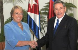 Pte. M. Bachelet is welcomed by Pte. R. Castro