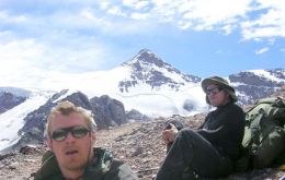Daniel (left) and Pete Biggs rest on the slopes of Mount Aconcagua