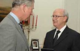 Rees receive MBE title from Prince Charles