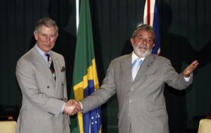 Prince Charles  shakes hands with Brazilian President Luiz Inacio Lula da Silva