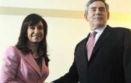 Pte.  CFK shakes hand with PM Brown