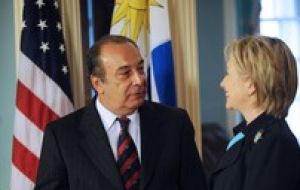 Secretary of State Hillary Clinton  (R) welcome  Uruguay's Foreign Affairs minister Gonzalo Fernandez