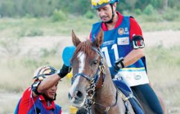 King Mizan Zainal Abidin during a horse resistance competition