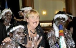 Indigenous Affairs minister Jenny Macklin pose with Aboriginal dancers from Arnhem Land