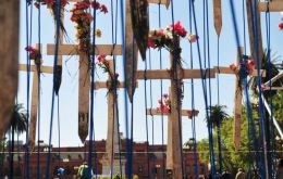 The exhibit at Plaza de Mayo with the original crosses from Darwin cemetery