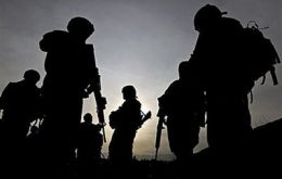 President Barack Obama orders 30,000 more US soldiers to Afghanistan but also spells out an exit strategy.