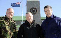 Left to right: Jim Foster, Tony Banks and Wayne Rees at Liberation Memorial in Stanley 