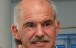 Greek PM George Papandreou satisfied with the decision 