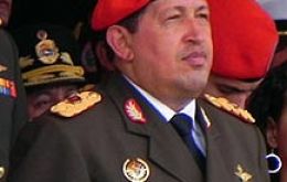 Chavez in full military uniform and red beret 