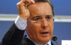 The outgoing Colombian leader, Alvaro Uribe  