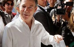 Juan Manuel Santos more than doubled his closest rival Antanas Mockus 