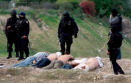 In the latest chapter of the ongoing fight the bodies of 58 men and 14 women were found killed by drug-cartels