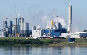 A post car of the bridge and the UPM/Botnia plant from the Argentine coast 