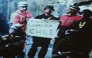 Mission Accomplished Chile - a banner held by rescuers after the operation