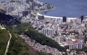 Millions live in the favelas on the morros of the contrasting city of Rio 