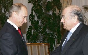 Russian PM Putin and FIFA president Blatter