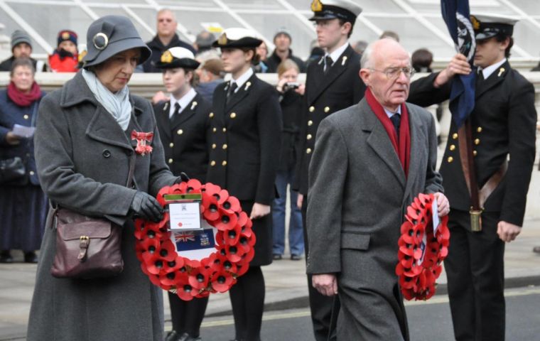 Sukey Cameron MBE and former Gov David Tatham go forward to lay their wreaths. (Photo P.Pepper)