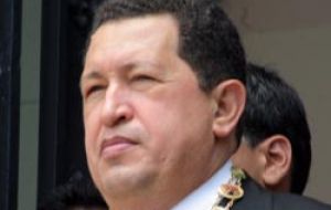 President Chavez takes full advantage of the down pouring and floods