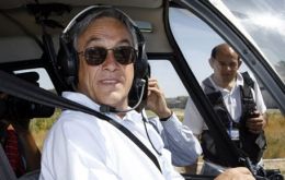 Piñera in his Robinson R44 helicopter 