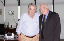 Strauss-Khan with Uruguayan President Jose Pepe Mujica (L)