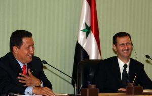 Chavez mid-east brother with President Bashar Assad
