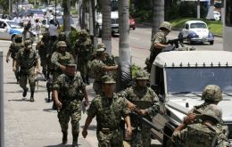 Some of the 50.000 Mexican troops patrolling the streets of the country’s main cities 